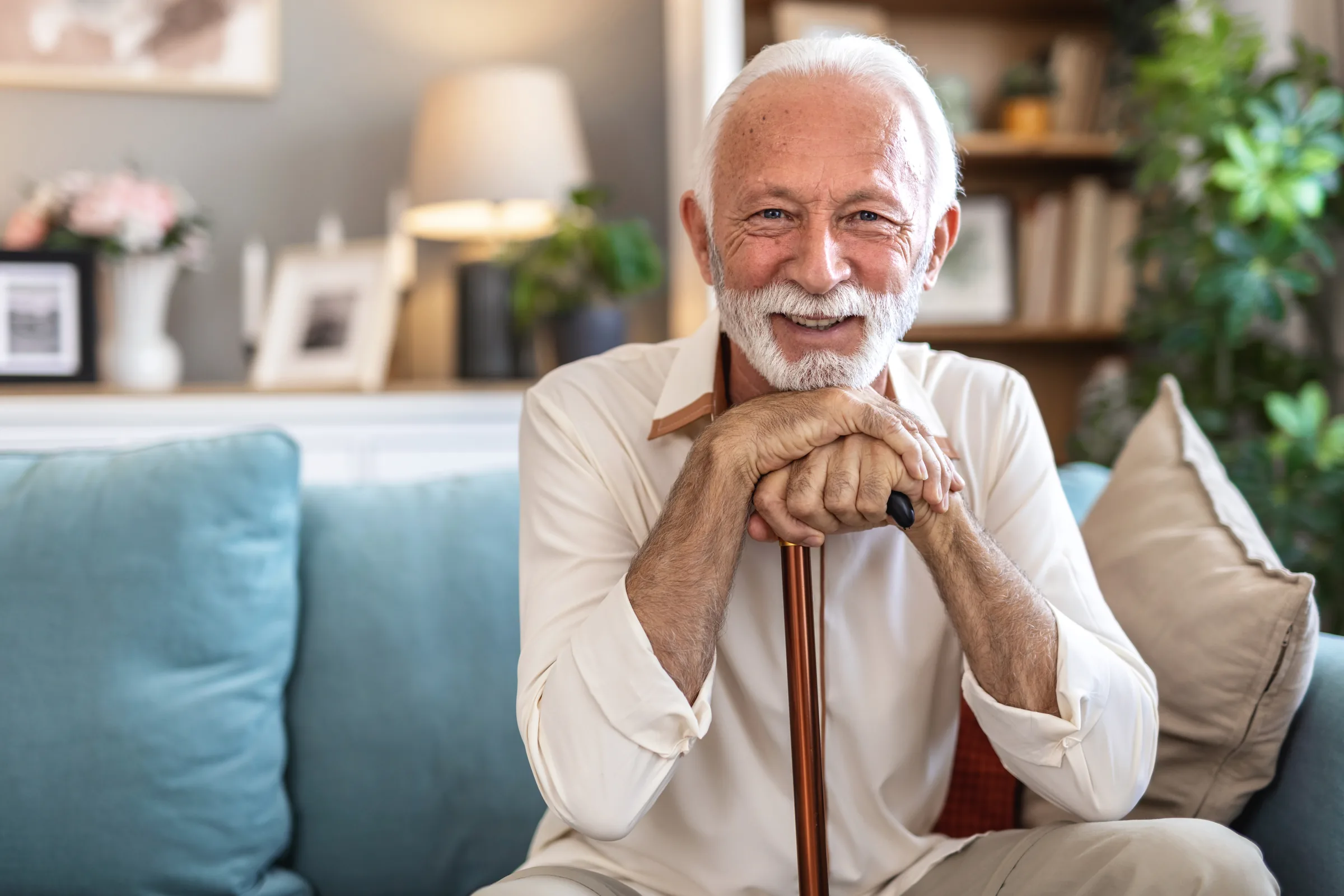 Patient smiling for denture cleaning and care education