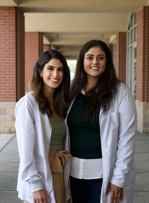Dr. Jasmin Dhanjal and Dr. Kimia Devine with the Noblesville Smile Center team