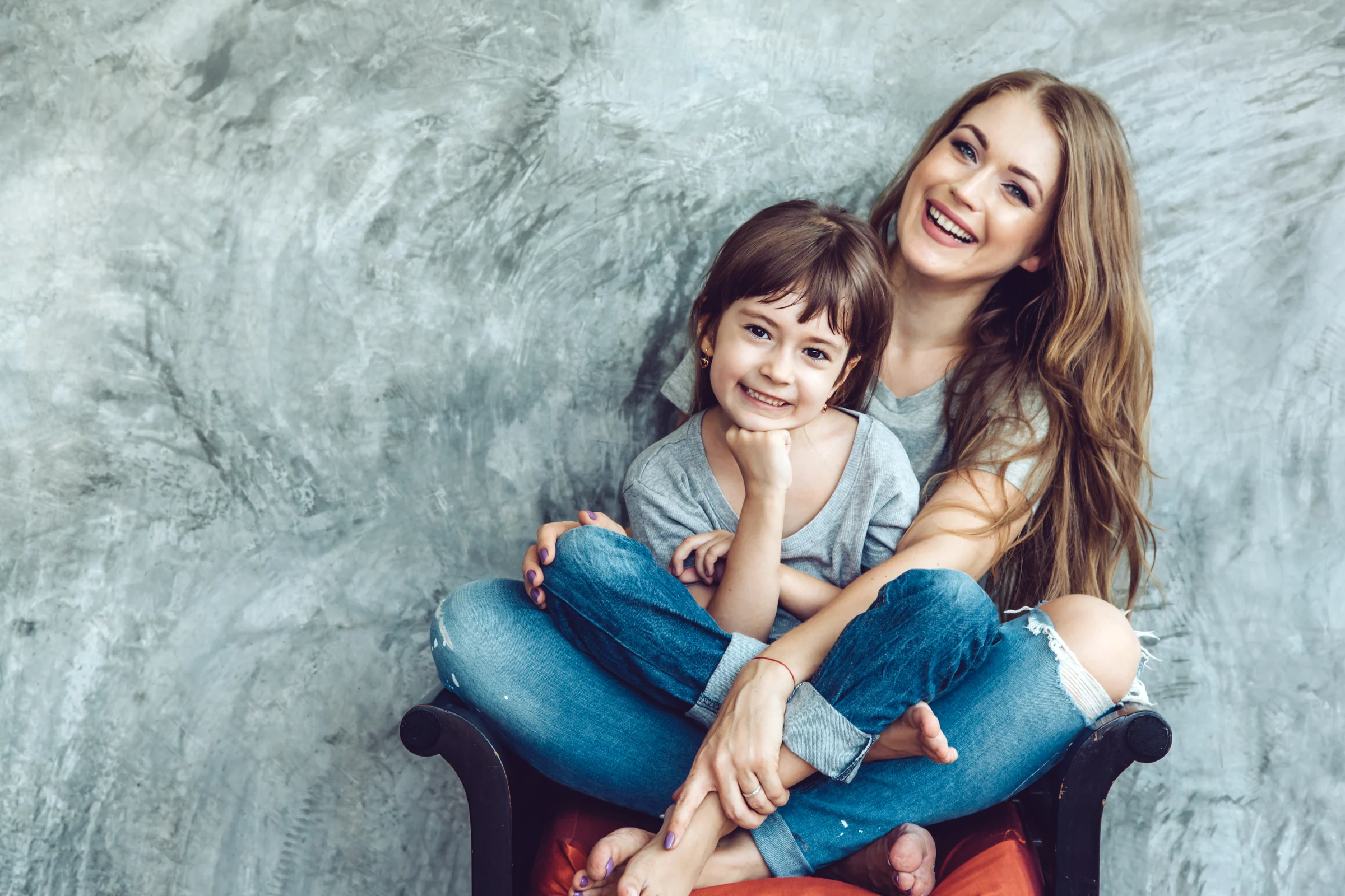 Mother and child smiling for family dentistry