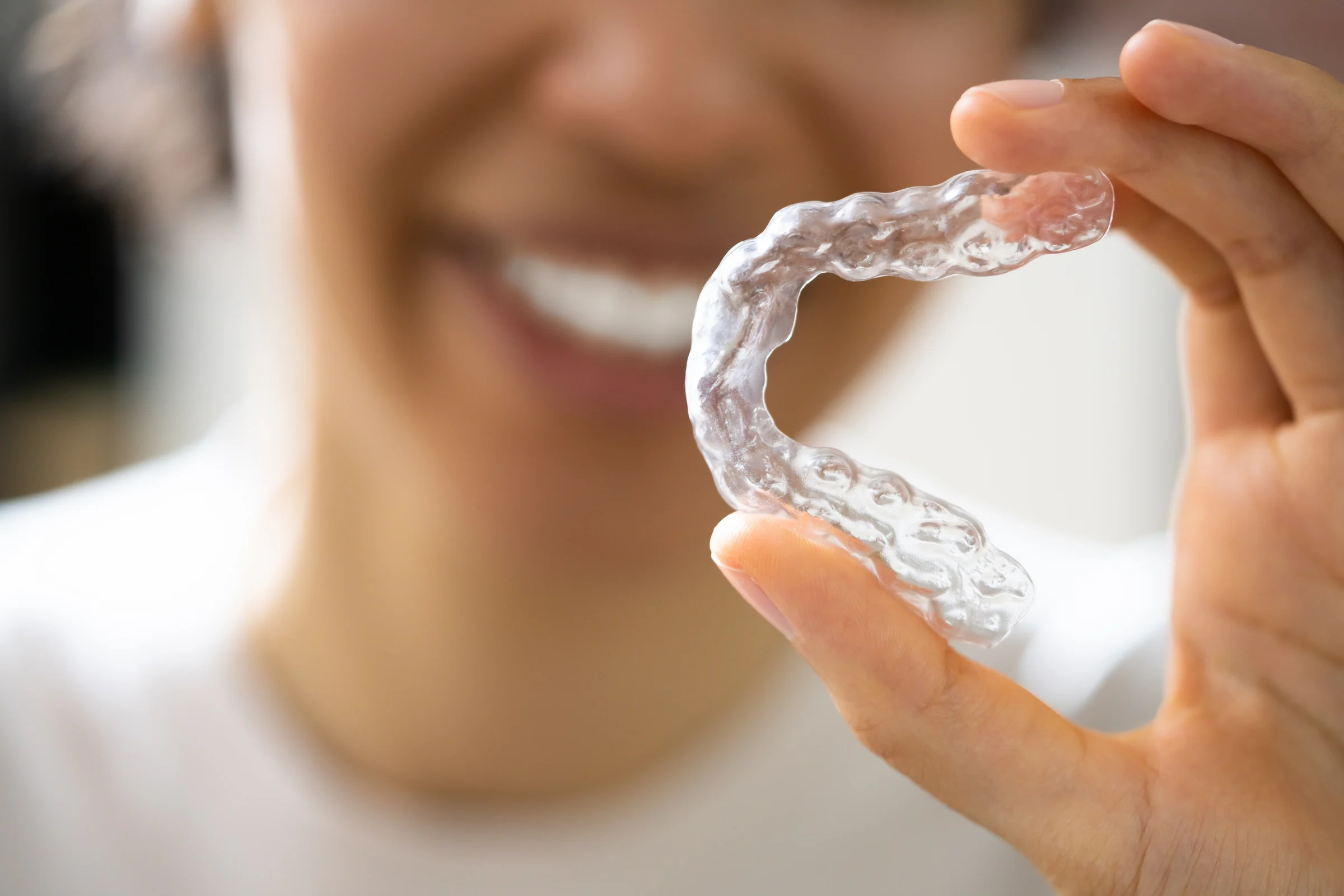 Clear Invisalign aligner close-up